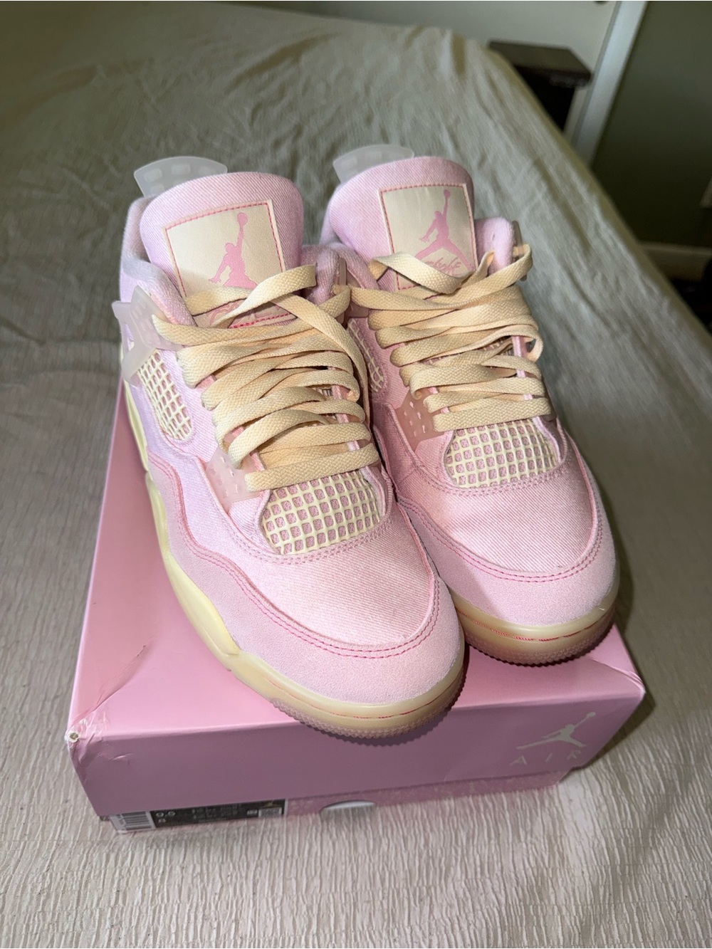 Jordan Pink and Cream Retro 4 Sneakers